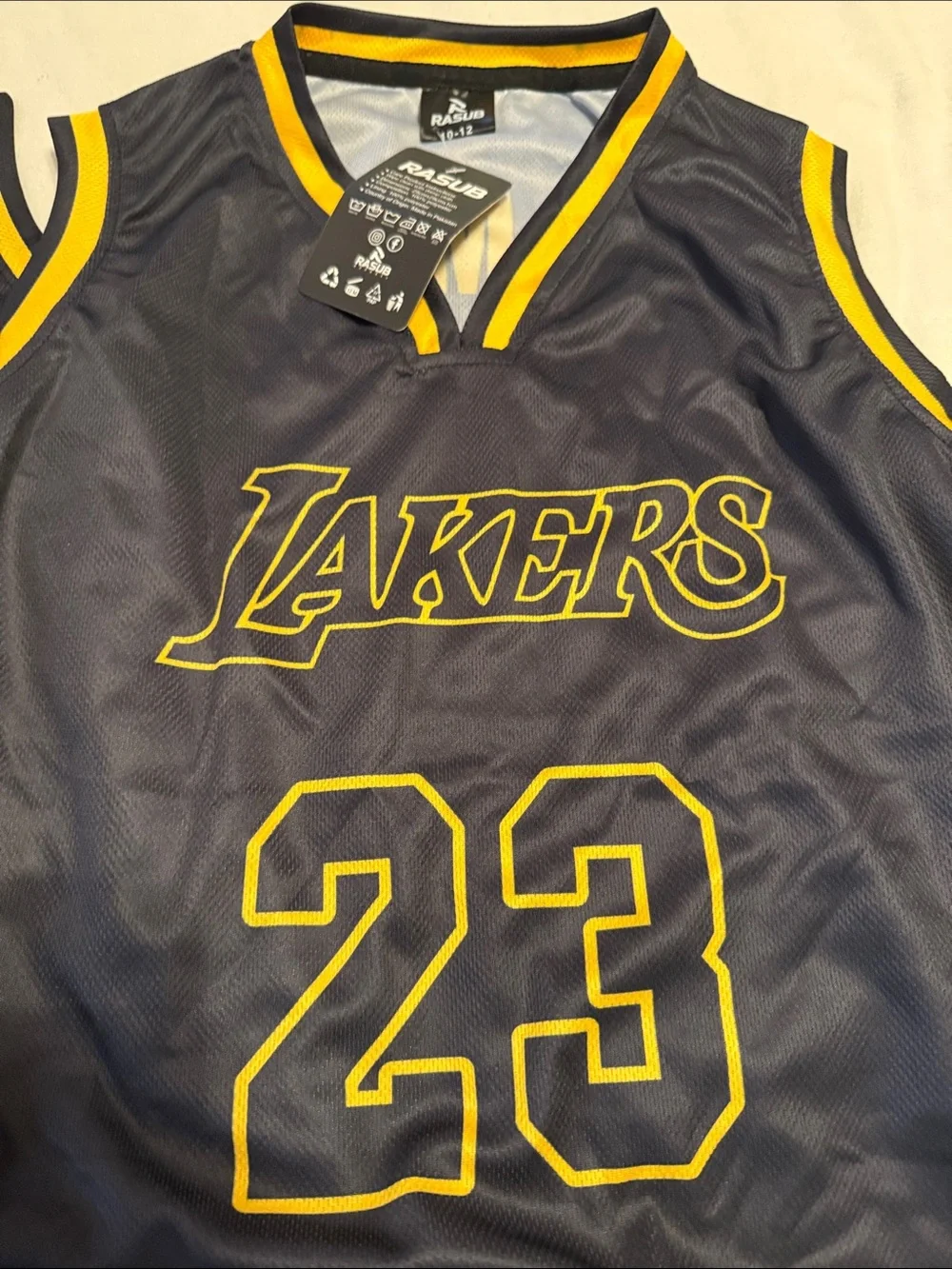 Size 8-10 Lakers Black & Gold Basketball Jerseys and shorts - 23 & 24